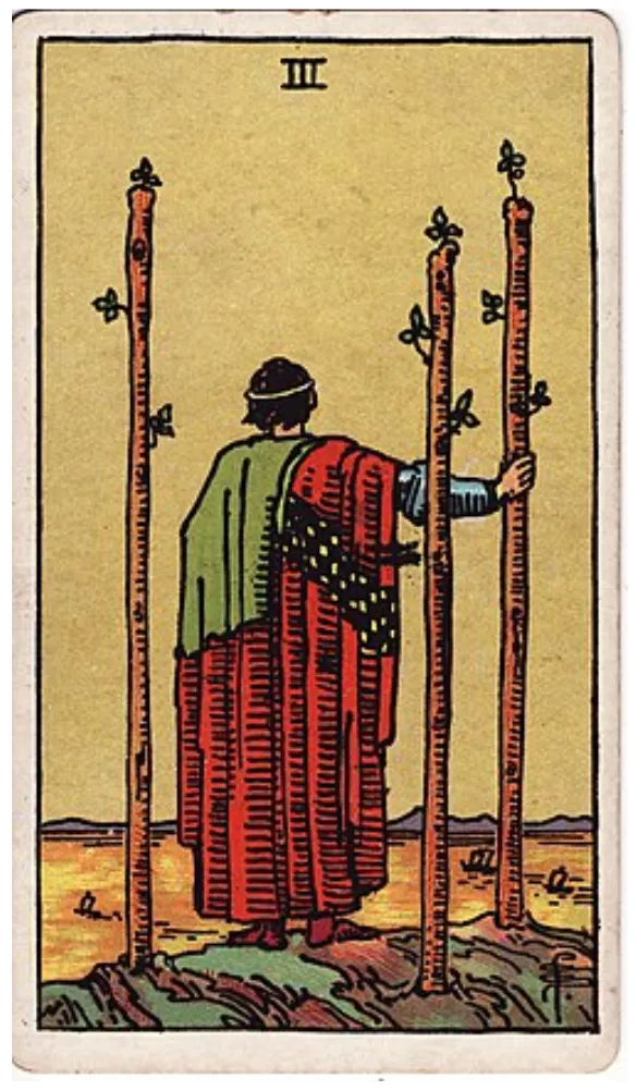 Những chi tiết trong lá bài Three of Wands thể hiện điều gì?