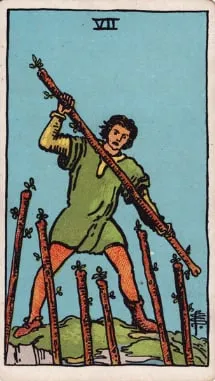 Những chi tiết trong lá bài Seven of Wands thể hiện điều gì?