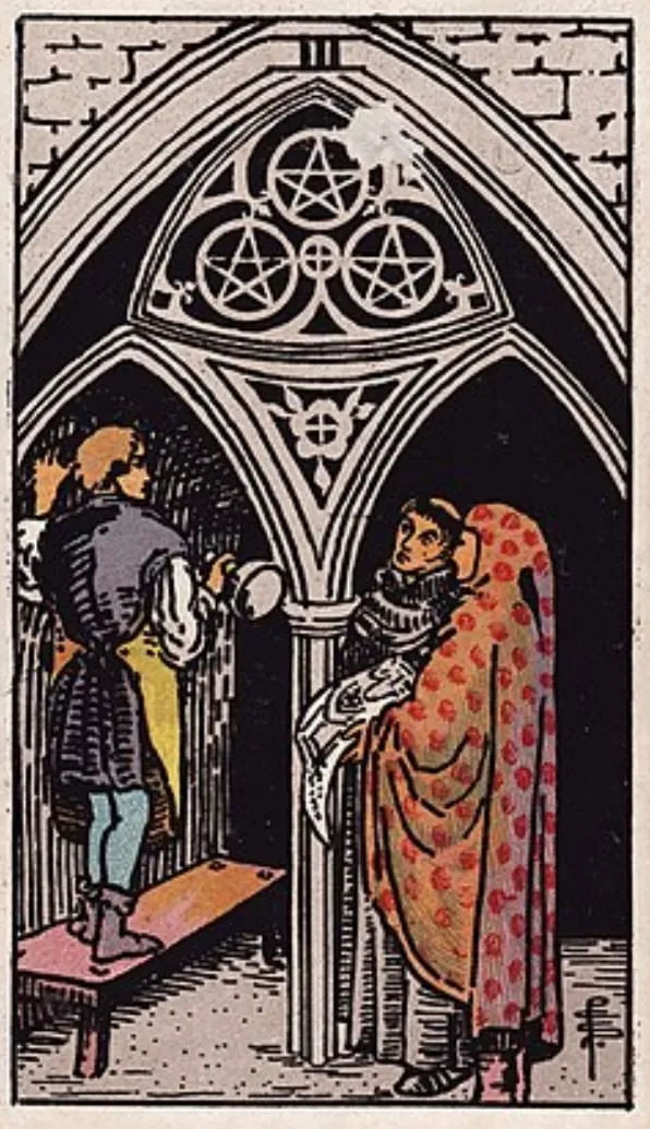 Những chi tiết trong lá bài Three of Pentacles thể hiện điều gì?